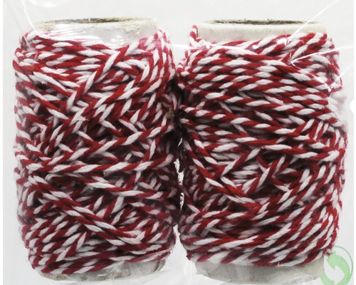 Două role de bandă decorativă roșu-albă