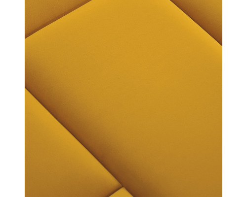 Panouri de perete galbene, capitonate, cu model geometric.