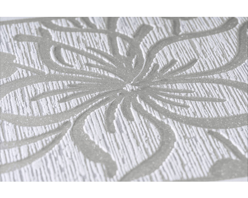 Prim-plan cu tapet cu model floral și textură în relief