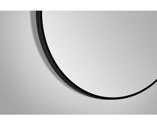 Imagine detaliată a unei oglinzi rotunde cu o ramă neagră
