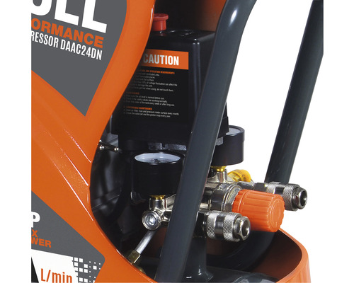 Imagine detaliată a unui compresor cu manometre și elemente de control