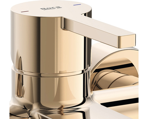 Logo Roca pe robinet auriu