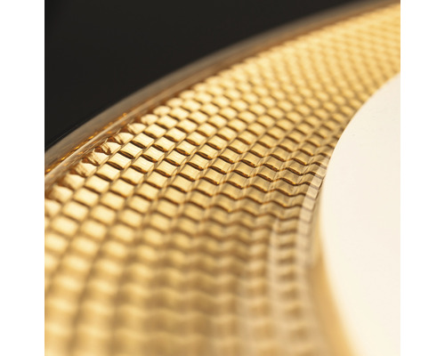 Prim-plan cu o lampă de tavan rotundă cu LED, cu model