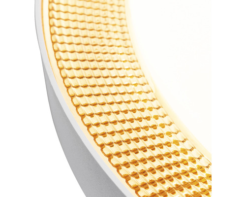 Prim-plan cu o lampă LED rotundă cu model punctat