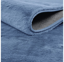 Prim-plan al unui covor cu fibre textile