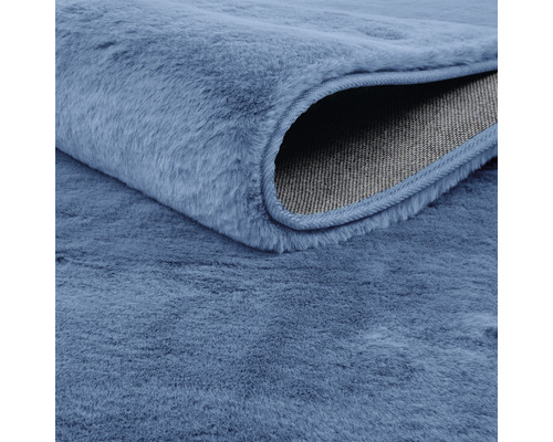Prim-plan al unui covor cu fibre textile