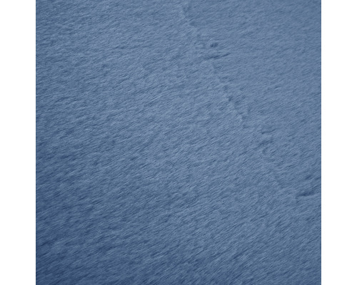 Prim-plan cu un covor albastru cu o textură moale