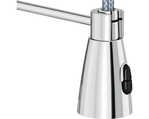 Prim-plan cu o lampă cu suprafață cromată și întrerupător