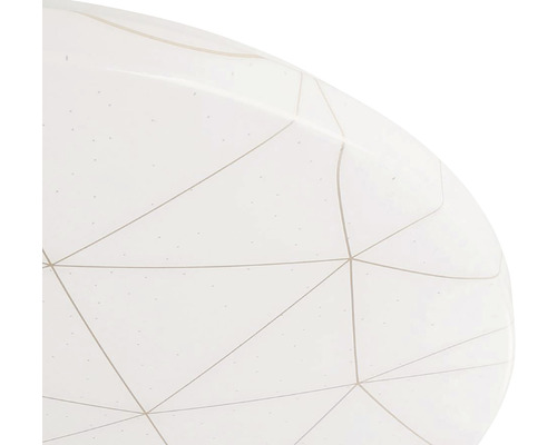 Prim-plan al unei lămpi de tavan cu model geometric
