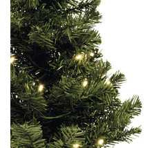 Prim-plan cu un pom de Crăciun artificial, verde, cu iluminare