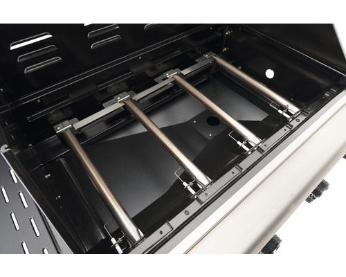 Vedere interioară a unui grătar pe gaz cu arzătoare din oțel inoxidabil