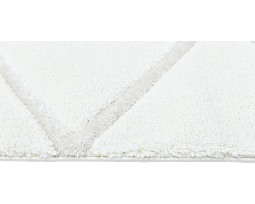 Covor alb cu model geometric