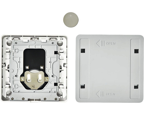 Vizualizare internă a unui termostat de cameră cu baterie tip pastilă și capac de carcasă