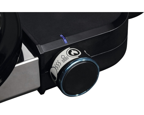 Prim-plan cu un regulator de grătar cu diverse setări