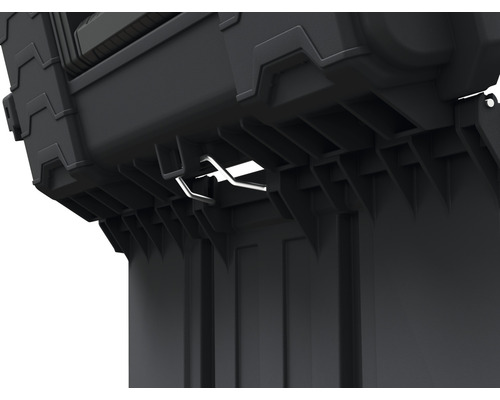 Imagine detaliată a unei cutii de scule cu închidere metalică.