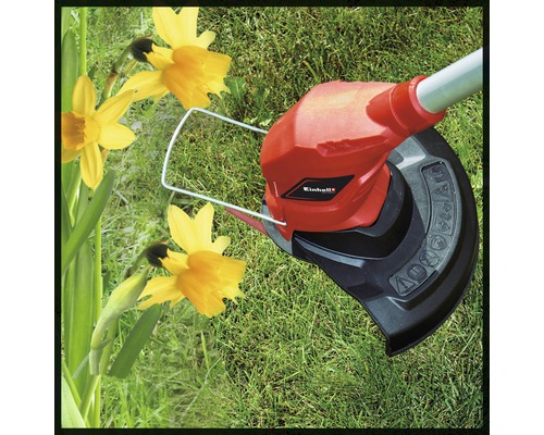 Logo Einhell motocoasă de gazon în funcțiune pe un gazon