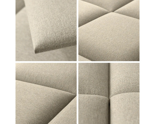 Prim-plan al unei canapele matlasate cu tapițerie din material textil