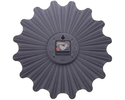 Spatele unui ceas de perete gri cu design de floarea-soarelui
