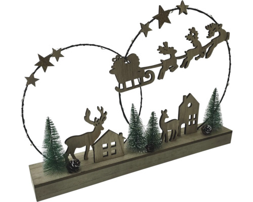 Decorațiune de Crăciun cu figurine din lemn reprezentând reni, case, brazi și o sanie cu Moș Crăciun pe un soclu din lemn
