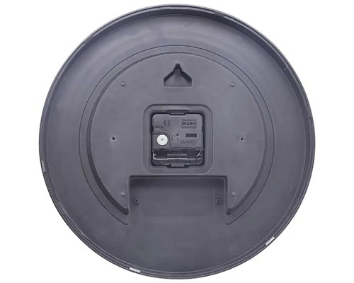 Partea din spate a unui ceas de perete rotund cu mecanism de cuarț