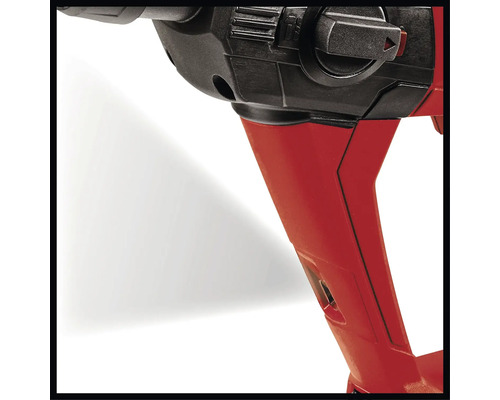 Prim-plan al unei mașini de găurit cu carcasă roșie și element de comandă negru