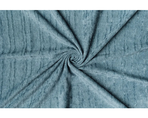 Prim-plan al unei țesături cu linii verticale și o formă ușoară de spirală.