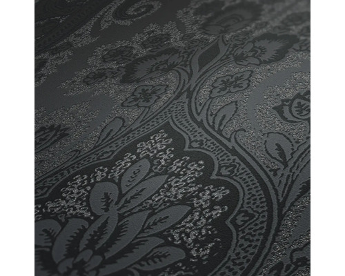 Prim-plan cu un tapet întunecat cu motiv floral