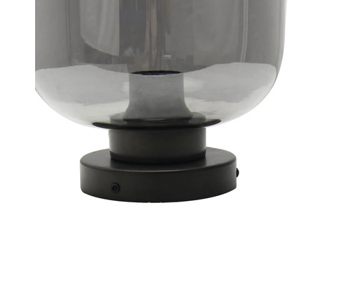 Imagine detaliată a unei lămpi de sticlă gri cu bază neagră