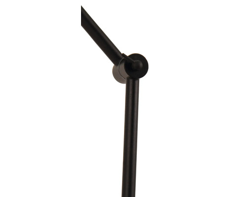 Prim-plan al unei articulații negre de lampă