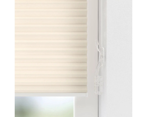 Prim-plan cu jaluzea pliată bej pentru fereastră, cu mecanism de operare