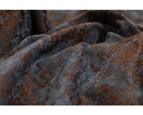 Prim-plan cu o țesătură decorativă cu model