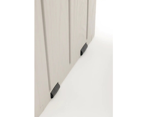 Vedere detaliată a unei cutii de grădină cu puncte de contact cu solul.