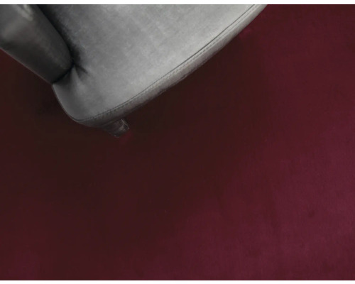 Prim-plan cu un covor și un picior de scaun