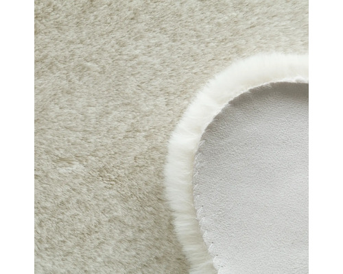 Vizualizare detaliată a unui covor cu fir și spate țesut