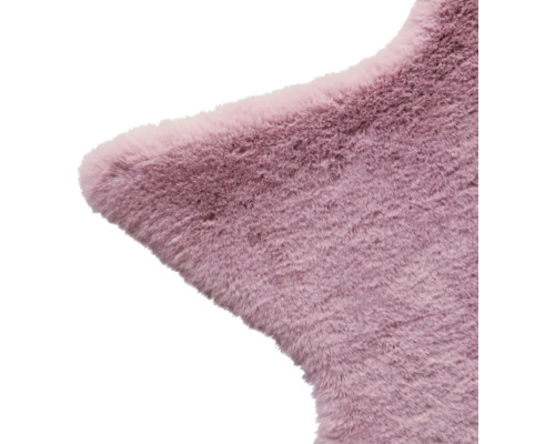 Prim-plan cu un covor în formă de stea cu o suprafață moale