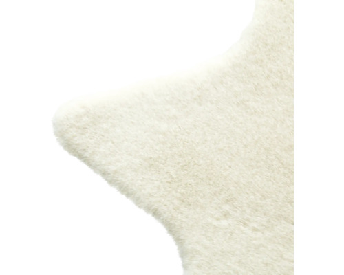 Prim-plan cu un covor cu textură de blană.