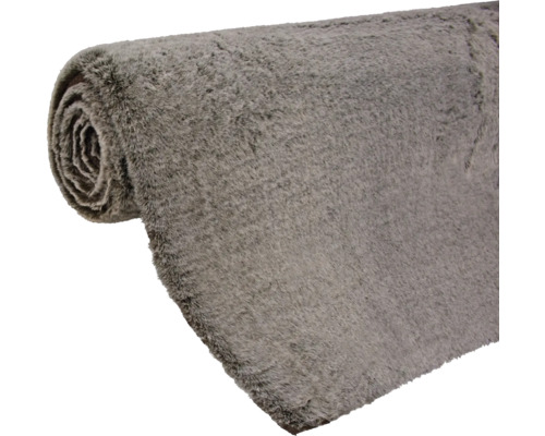 Covor gri sub formă de rolă
