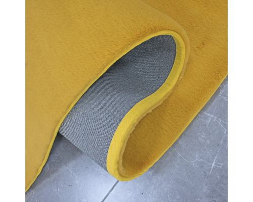 Vizualizare detaliată a unui covor cu suport textil