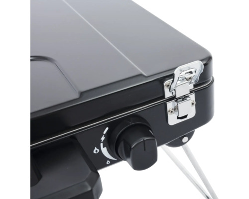 Imagine detaliată cu aragaz pe gaz negru cu regulator și închizătoare