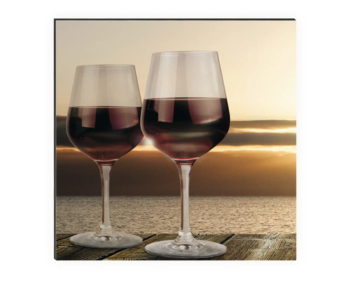 Tablou de perete cu două pahare de vin în fața unui apus de soare