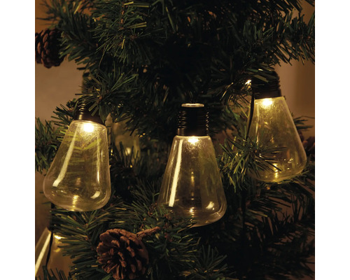 Ghirlandă luminoasă decorativă cu becuri pe un brad de Crăciun