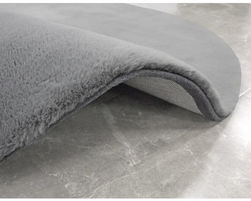 Imagine detaliată a unui covor rotund cu fibre