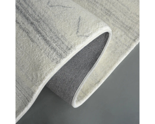 Covor cu model și spate țesut