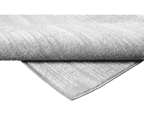 Prim-plan cu un covor gri cu model texturat