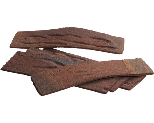 Mai multe cărămizi maro cu suprafață neuniformă stivuite.