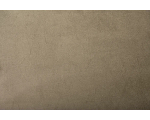 Prim-plan cu o suprafață bej cu o textură ușoară.