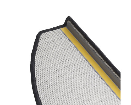 Secțiune a unui covoraș cu strat de acoperire pe spate și suprafață textilă