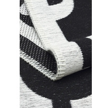 Prim-plan al unei pături textile cu model