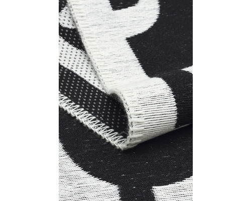 Prim-plan al unei pături textile cu model