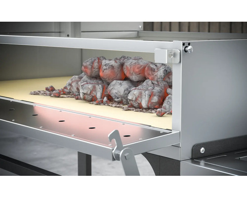 Grătar cu cărbune de lemn în coșul de aprindere